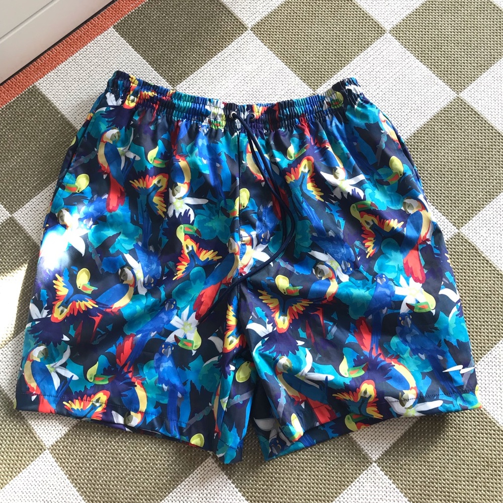 OUTPLAY Gender Inclusive Parrot Print Abstract Swim Shorts